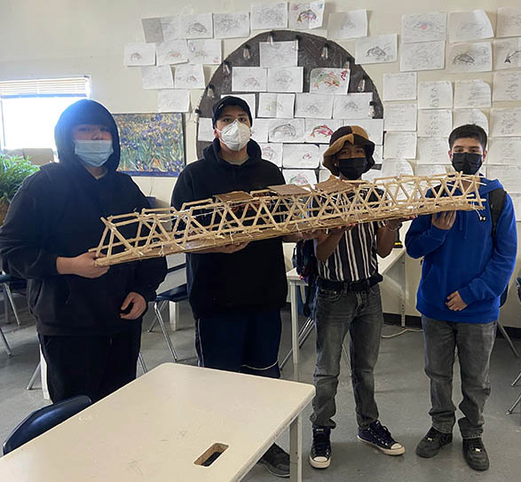 STEM students creating bridge